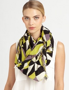 Trimmed in allover fringe, this vibrant, kaleidoscope-printed wrap has a little edge.Viscose44 X 78Hand washImported