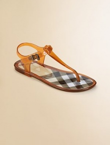 The jelly sandal gets checked out in a thong silhouette with check sole.Adjustable buckle strapPVC upperPVC liningPVC soleImported The jelly sandal gets checked out in a thong silhouette with check sole.Adjustable buckle strapPVC upperPVC liningPVC soleImported