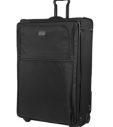 Larger than life luxury. The Tumi Alpha collection's largest wheeled packing case, this amazing expandable upright offers the option of carrying suits and even has a removable tote bag to help you bring home extra items acquired during your travels. Tumi quality assurance warranty.