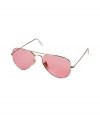 Originally designed for fighter pilots, Ray-Bans Aviator sunglasses are an iconic choice guaranteed to take you through the seasons in cool style - Gold-toned metal frames, vintage colored pink polarized lenses, clear nude nose-pieces, clear earpieces - Lens filter category 3, prescription friendly - Comes with a coral-colored logo-stamped semi-hard carrying case - Amp up your look with a leather bomber jacket and edgy ankle boots