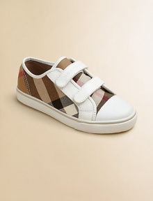 Sturdy cotton canvas in bold Burberry checks, fashioned into a low-top sneaker with all-day comfort for your young jumper, climber and playground dweller.Double grip-tape strapsCotton canvas upper with leather trimRubber solePadded insoleImported