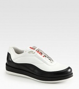 Sleek, sophisticated leather with signature logo detail.Leather upperLeather liningPadded insoleRubber soleMade in Italy