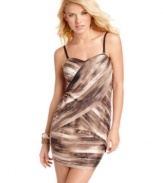 Pleated, asymmetrical panels at the bodice make for a modern design on a party dress that converts from sleeveless to strapless! By GUESS?.