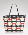 A playful spin on the practical tote, this kate spade new york carryall is crafted of vinyl for durable on-duty style.
