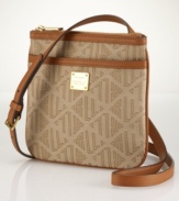 Designed with chic Deco-inspired logos for a hint of vintage charm, this elegant Lauren by Ralph Lauren jacquard bag is crafted in an of-the-moment crossbody silhouette with supple vachetta leather trim.