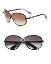 Oversized criss-cross frame holds a floating lens, with a logo medallion on the arms. Available in brown with brown gradient lens or gunmetal with smoke gradient lens. 100% UV protection Metal Made in Italy