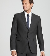 Two button, notched lapel sport coat. Front flap pockets and chest pocket. Slim fit, with a slight stretch, for a sleek body-hugging silhouette.