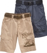 A little rugged. Bring out his outdoorsy side with these belted cargo shorts from Guess.