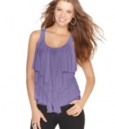 Sugar & Spice's ruffle front tank pairs perfectly with jeans and and a chunky wedge. Ideal for a summer bbq, this top looks chic all season!