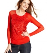 Tonal sequins light up this DKNY Jeans mesh top. Pair it with denim for a casual, yet totally glam ensemble!