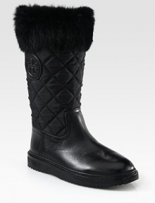 Soft rabbit fur tops this quilted nylon and leather essential, with a rubber trek sole for durability and added traction. Rubber heel, 1 (25mm)Rubber platform, ¾ (20mm)Shaft, 11¼Leg circumference, 13Nylon and leather upper with rabbit fur trimPull-on styleFleece liningRubber solePadded insoleImported