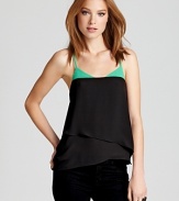 Update your summer collection with this BCBGMAXAZRIA top, enlivened by a vibrant lash of color at the neckline.