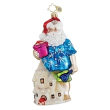 Santa goes on vacation too-in a palm print shirt he's perfectly beach ready, standing next to a sandcastle holding a bucket and shovel. Santa goes on vacation too-in a palm print shirt he's perfectly beach ready, standing next to a sandcastle holding a bucket and shovel.