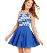 Make waves in this dream dress from Tommy Girl, where a top of scalloped print is anchored by a full and swingy skirt!