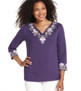 An easy top from Karen Scott features a pretty floral motif at the neckline and cuffs for a feminine touch. Studded accents add a little sparkle, too!