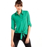 Get all tied up in cute style with this button-down tie-front top from BCX!