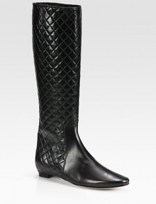 Luxurious quilting defines this tall silhouette, expertly crafted of supple Italian leather. Shaft, 15¾Leg circumference, 13Leather upperPull-on styleLeather lining and solePadded insoleMade in Italy