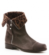 Stuart Weitzman's short boots are long on style with foldover, leopard shafts that are spot-on with the animal print trend.