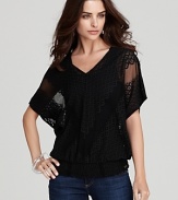 Ornately detailed, this GUESS top transitions effortlessly from day to night.