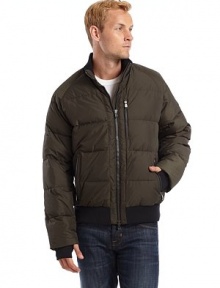 THE LOOKWindproof down bomber jacketRib-knit stand collarTwo-way front zip closureThree vertical zip pocketsLong sleeves with hand-warmer cuffsRib-knit bottom bandTwo inner security pocketsTHE FITAbout 28 from shoulder to hemTHE MATERIALShell: polyesterLining: nylonFill: 90% down/10% feathersCARE & ORIGINMachine washImported