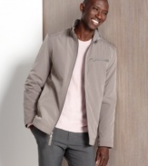 Getting caught in the rain will be no big deal when you're sporting this waterproof jacket from Perry Ellis.