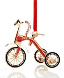 Feel like a kid on Christmas morning with a shiny red and gold tricycle outfitted with streamers and a bell. From ChemArt. Feel like a kid on Christmas morning with a shiny red and gold tricycle outfitted with streamers and a bell. From ChemArt.