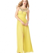 BCBGMAXAZRIA's radiant evening gown is crafted of a luxurious silk and bedecked with brilliant beading at the neckline and chest. The flowing, feminine silhouette is flattering on almost every figure.