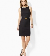 Crafted in a chic shift silhouette, an elegant dress is finished with two-toned detailing and a belted waist for a flattering fit.