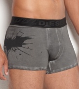 Superhero style? These Batman trunks from Diesel give mystery to your dark night look.
