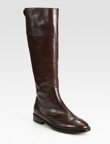 Fine craftsmanship defines this tall leather silhouette with classic wingtip details. Stacked heel, 1 (25mm)Shaft, 16Leg circumference, 13½Leather upperBack zip with top button closureLeather liningRubber solePadded insoleMade in Italy