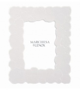 Cherish memories with the fresh and chic Marchesa Rose picture frame. White bone china sculpted with blooms inspired by the designer's couture gowns infuse a room with modern romance. From Marchesa by Lenox.