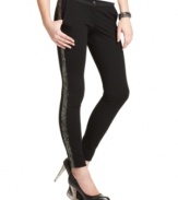 Jessica Simpson gives this season's must-have tuxedo-stripe skinny pants a festive upgrade with the inclusion of shimmery sequins!