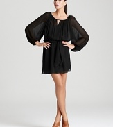 An ultra-billowy silhouette brings free-spirited style to this black Rebecca Taylor dress, complete with a waist-defining sash belt.