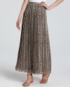 Scale up your look with this snake-print MICHAEL Michael Kors maxi skirt, brimming with delicate pleats for exotic elegance.