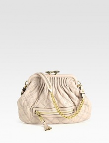 Softly-quilted leather takes on a lady-like shape in this framed kiss-lock design.Shoulder strap, 12 dropKisslock closureOne outside zip pocketOne inside zip pocketLinen lining12W X 9H X 1/2DMade in Italy