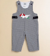 A charming one-piece in an overall design with a check pattern and puppy appliqué.ScoopneckShoulder straps with button closureSide buttonsBottom snaps65% cotton/35% rayonDry cleanImported Please note: Number of buttons and snaps may vary depending on size ordered. 