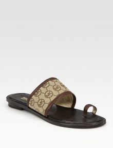 Classic canvas monogram design with rich leather trim and a trend-forward toe ring. Leather and printed canvas upperLeather liningRubber solePadded insoleImported
