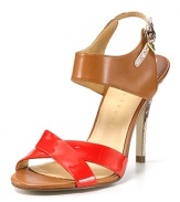 Snakeskin embossed leather lends a provocative feel to a bi-color sandal silhouette from IVANKA TRUMP.