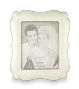 Capture your most magical moments with this large, porcelain frame.  Scalloped edges and a luminous finish combine for a truly elegant effect. Qualifies for Rebate
