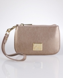 Exuding chic modern polish in supple textured leather, the Newbury wristlet is a versatile complement to any ensemble in a slender silhouette with optional wrist strap. Exuding chic modern polish in supple textured leather, the Newbury wristlet is a versatile complement to any ensemble in a slender silhouette with optional wrist strap.