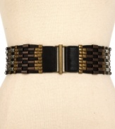 Bring the heavy metal with this wide stretch belt from Steve Madden. Dare to add a little industrial-chic to your workday look.