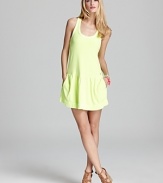 A high-voltage hue amps up this Juicy Couture tank dress. Team with a strappy neon bikini and hit the beach.