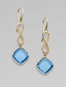 From the Cushion Collection. Faceted blue topaz is suspended from an elegant figure eight of cabled 18k yellow gold.Blue topaz 18k yellow gold Length, about 1¼ French wire Imported From the Cushion Collection. Faceted blue topaz is suspended from an elegant figure eight of cabled 18k yellow gold.Blue topaz 18k yellow gold Length, about 1¼ French wire Imported