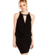 Designed with an assembly of tough, copper studs -- and a cutout that exposes slivers of back -- this draped party dress from Jump is all about elegance with attitude.