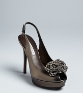 These always-elegant Vera Wang Lavender Label platform pumps feature stand-out, beaded details atop modest peep toes.