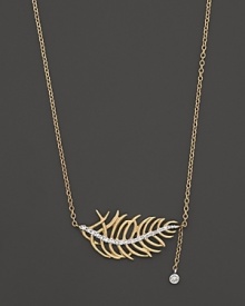 Diamonds add sparkle to a 14K yellow gold leaf. By Meira T. Diamonds add sparkle to a 14K yellow gold leaf. By Meira T.