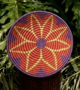 Full of life, the handcrafted Burst of Joy fruit bowl features a bold flower design woven in sisal and teeming with Rwanda's cheeriest spring colors. A fun, one-of-a-kind accent for the table that makes a beautiful statement year round.