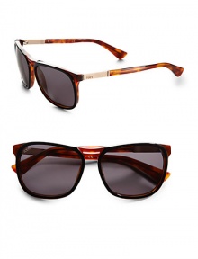 THE LOOKRounded square style Variegated acetate framesCutout detail on bridgeLogo etched lens Metal-accented logo templesSignature case includedTHE COLORBlack tortoise with smoke lensesORIGINMade in Italy