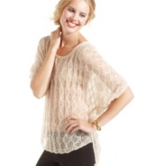 An airy, open-knit sweater that drapes the body in chic style! Jessica Simpson's high-low pullover brings a spirit of effortless cool to your favorite skinny jeans.