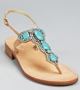 Translucent crystals rest atop shimmering metallic leather on a sleek and simple sandal silhouette. From IVANKA TRUMP.